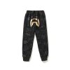BAPE x NBHD joint style shark head black and gold trousers BAPE x NBHD joint style shark head black and gold trousers