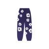 1AB5AF7391710 Denim Tears The Cotton Wreath Sweatpants Purple
