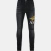 AMIRI STARBURST APPLIQUE SKINNY JEAN AMIRI STARBURST APPLIQUE SKINNY JEAN