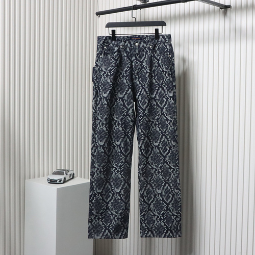 Louis Vuitton asymmetric snake print jeans