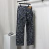 Louis Vuitton asymmetric snake print jeans