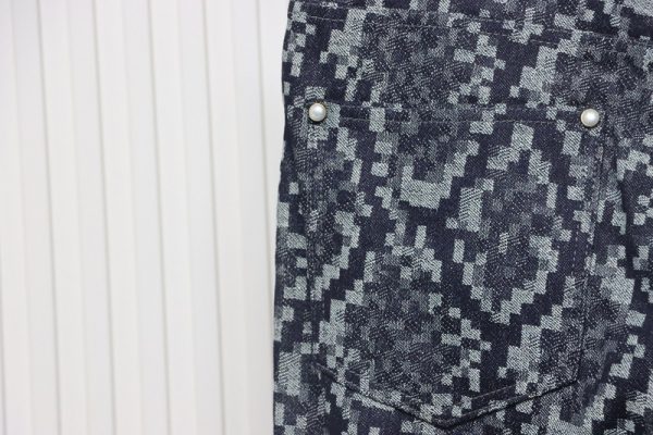 Louis Vuitton asymmetric snake print jeans