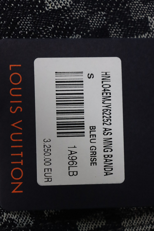 Louis Vuitton asymmetric snake print jeans